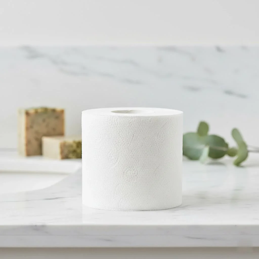 Stack of neatly folded reusable toilet paper squares